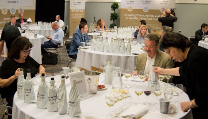 Professional wine tasters judging the wines Professional wine tasters judging the wines.